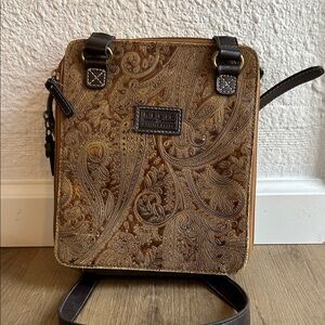 Relic Embossed Tan Messenger Bag
